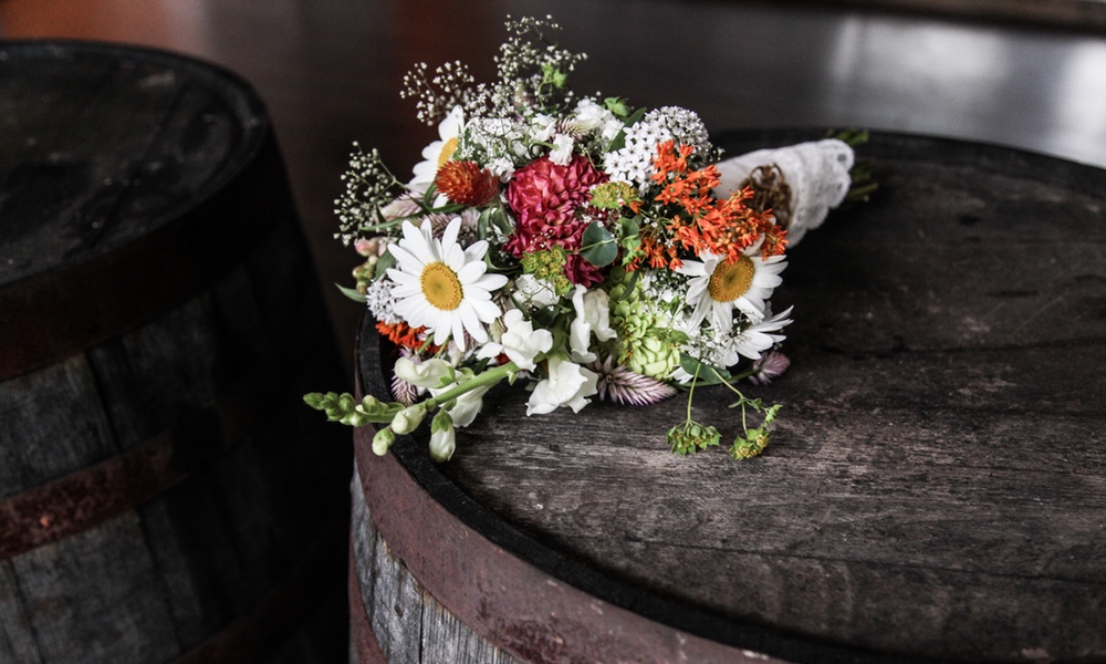 Our farm wedding was everything we dreamed it would be... beautiful setting, amazing flowers, and of course goats!