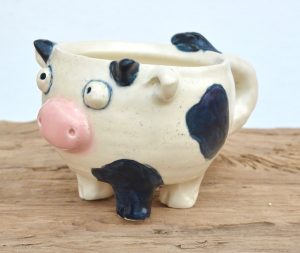 Bessie the cow mug is itching to come home with you! She'll be sure to make you smile each and every morning!